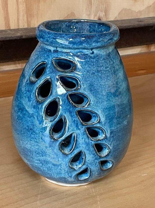 Hand pierced blue pot